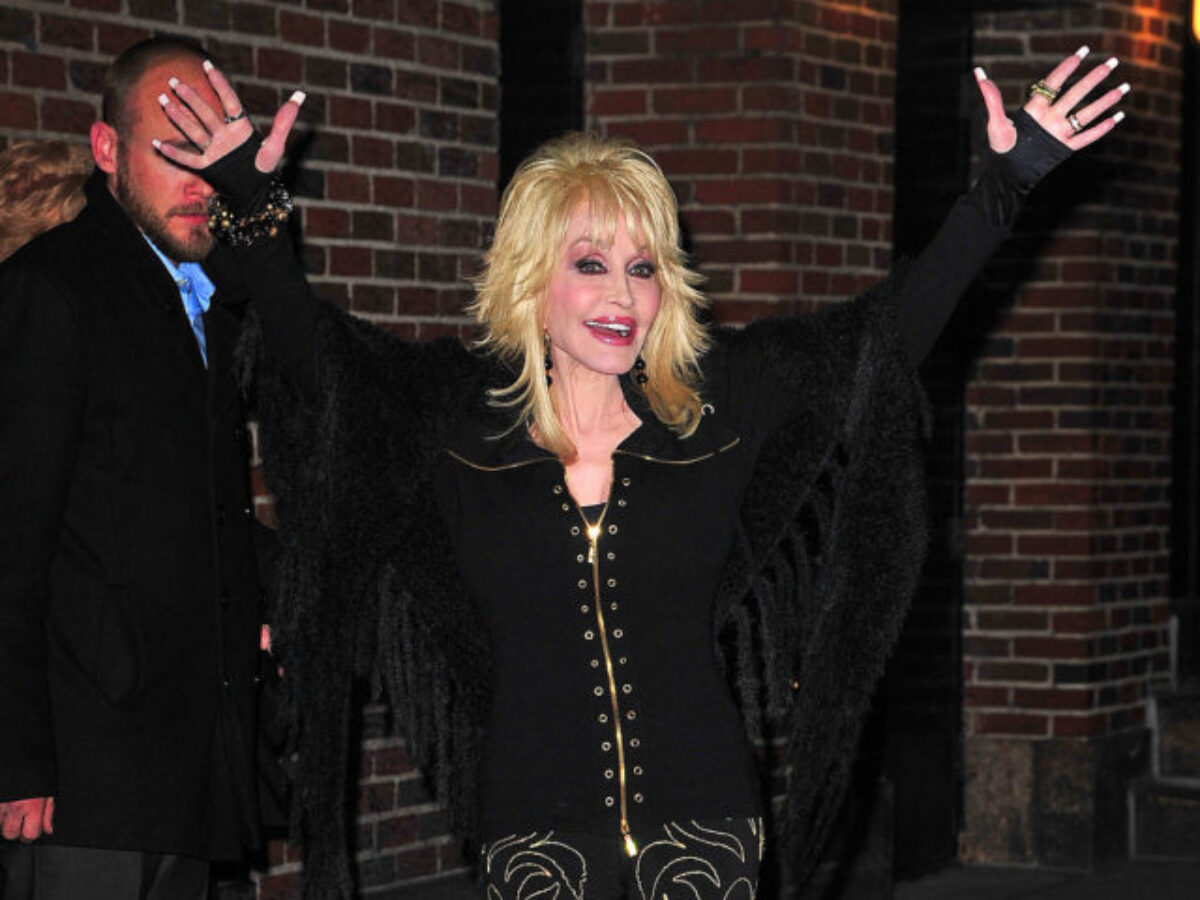 Why Does Dolly Parton Wear Gloves